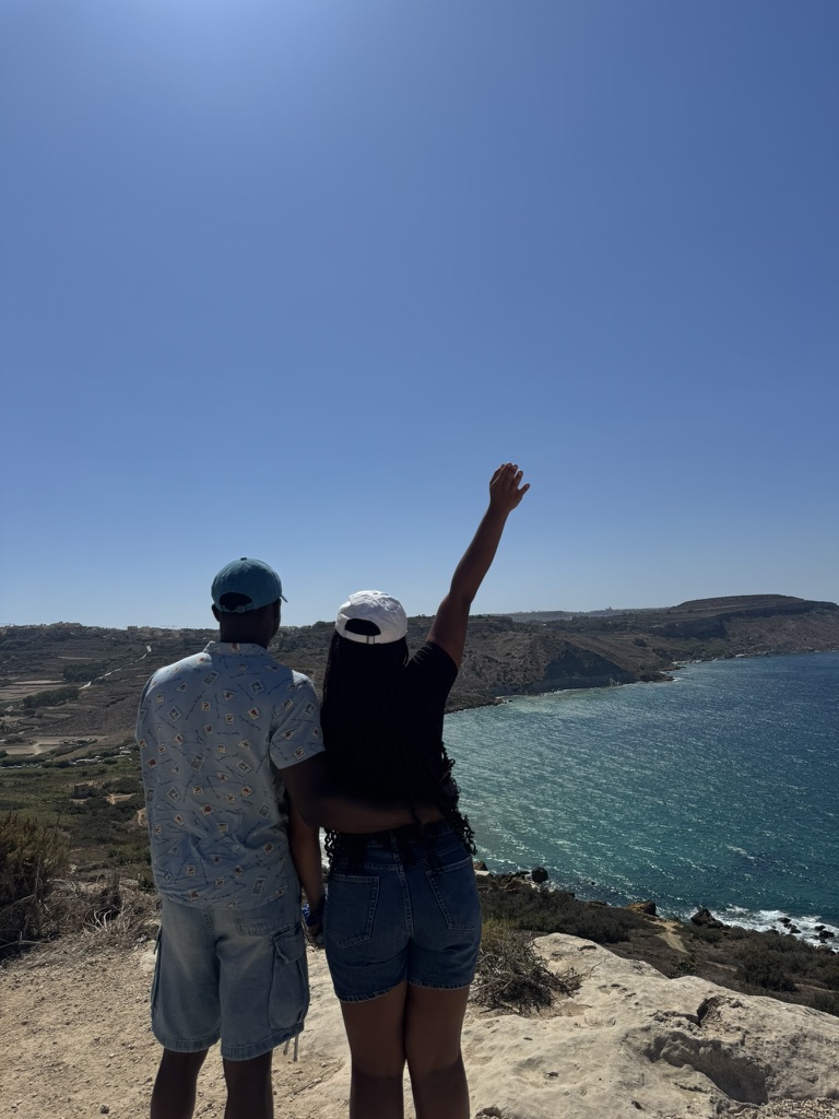 Eric and Sade enjoying a beautiful hill view in Malta